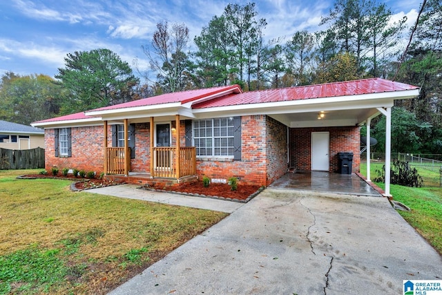 single story home featuring a front yard and a carport