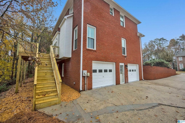 view of property exterior with a garage