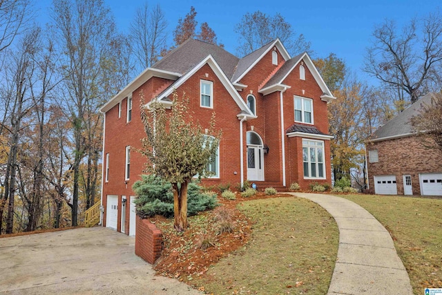 front facade with a front yard