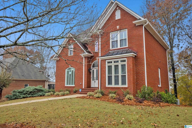 front of property featuring a front yard