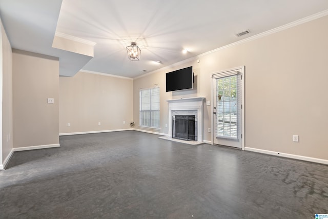 unfurnished living room with a chandelier, crown molding, and a premium fireplace