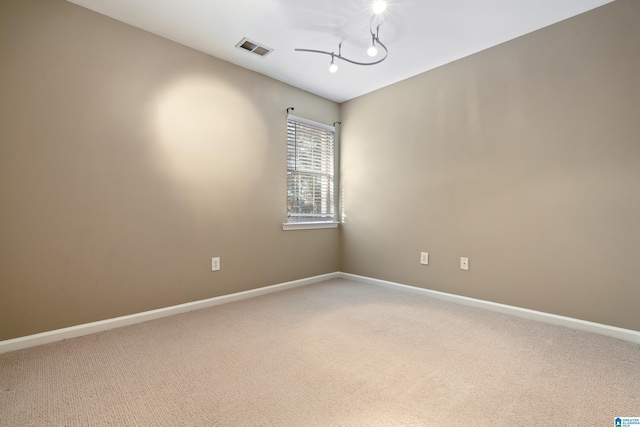 unfurnished room with carpet floors