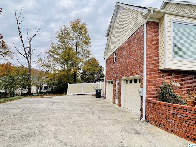 view of home's exterior featuring a garage