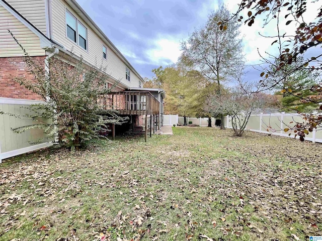 view of yard with a deck