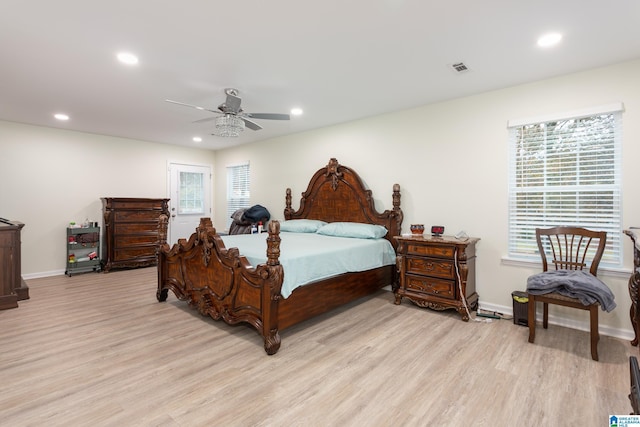 bedroom featuring ceiling fan and light hardwood / wood-style floors