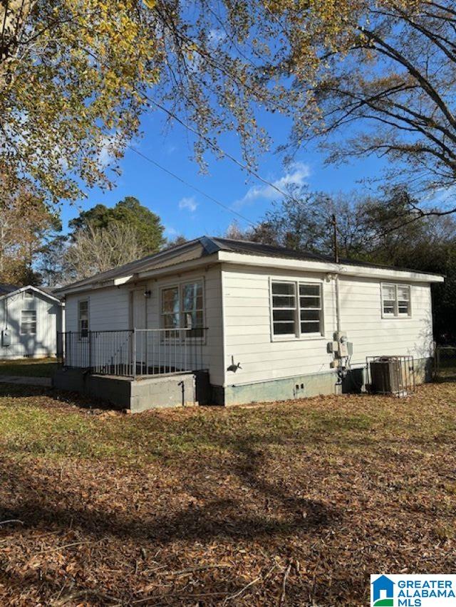 exterior space featuring central AC unit