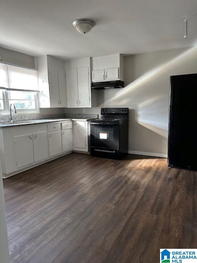 kitchen featuring dark wood-type flooring, white cabinets, black appliances, and sink