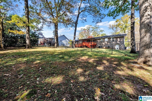 view of yard featuring a deck