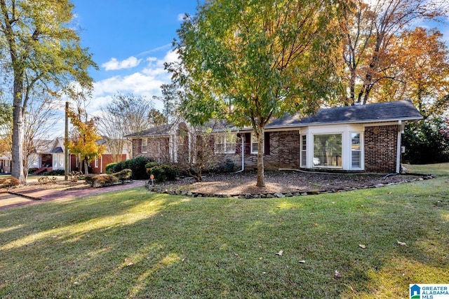 exterior space with a front lawn