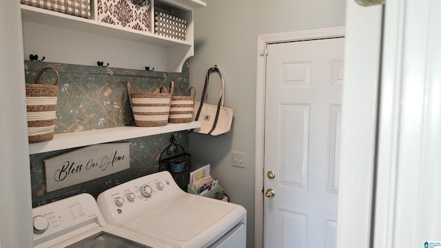 clothes washing area featuring washing machine and dryer