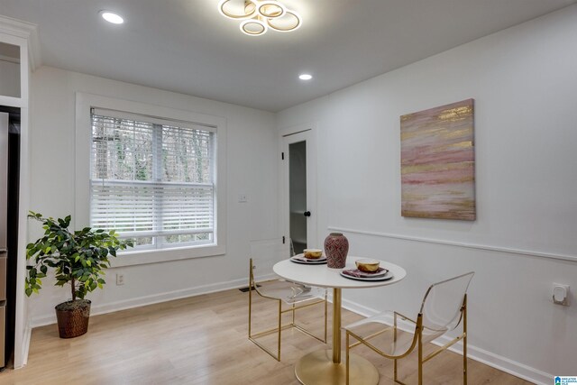 dining room with light hardwood / wood-style floors