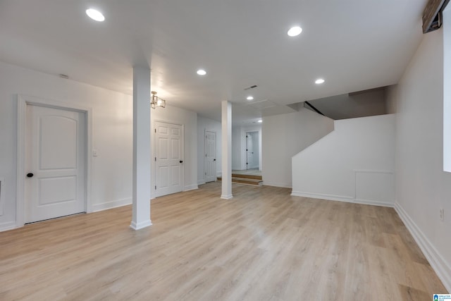 basement featuring light hardwood / wood-style floors