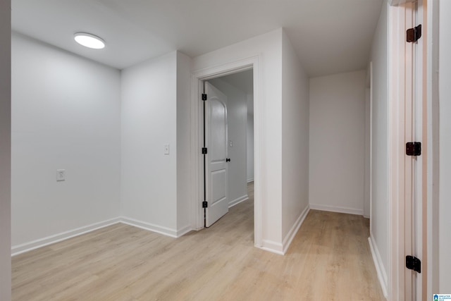 corridor featuring light hardwood / wood-style floors