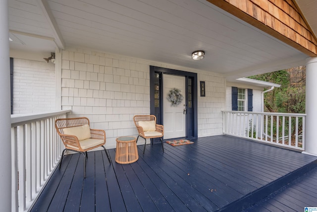 wooden deck with a porch