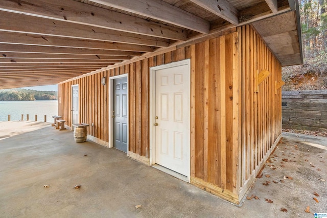 view of outbuilding featuring a water view