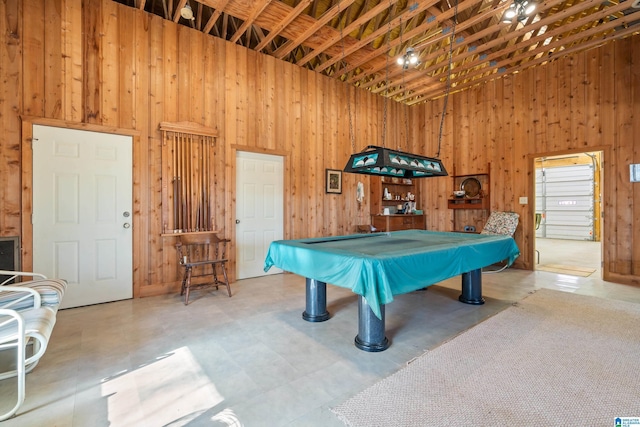 game room featuring a high ceiling and pool table