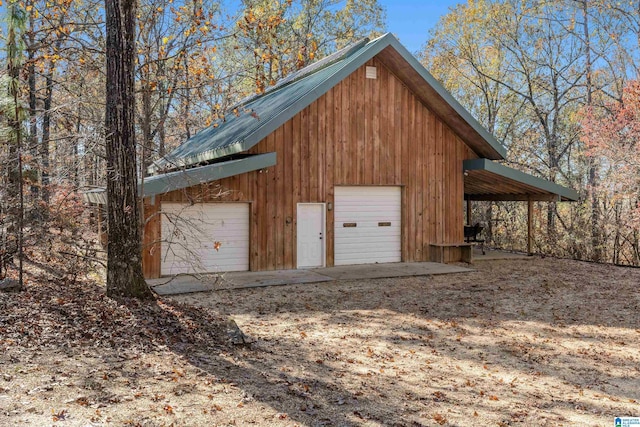 view of outbuilding with a garage