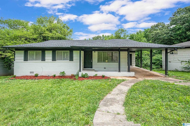 single story home featuring a front yard and a carport