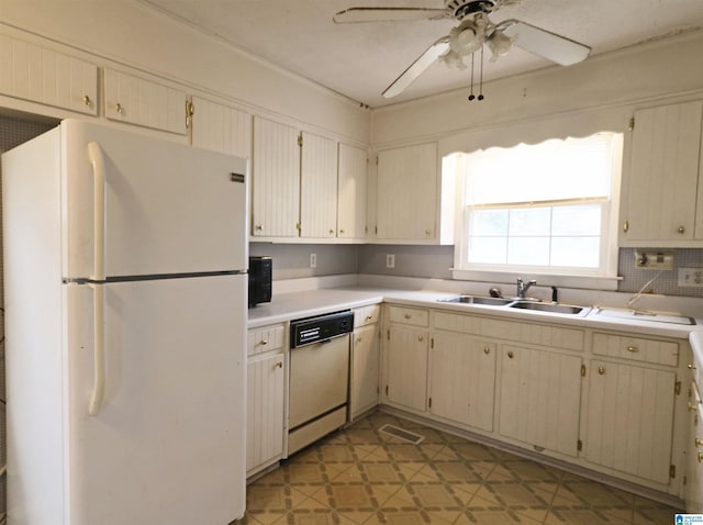 kitchen with backsplash, white appliances, ceiling fan, sink, and cream cabinets