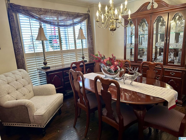 dining area with an inviting chandelier, plenty of natural light, dark wood-type flooring, and crown molding