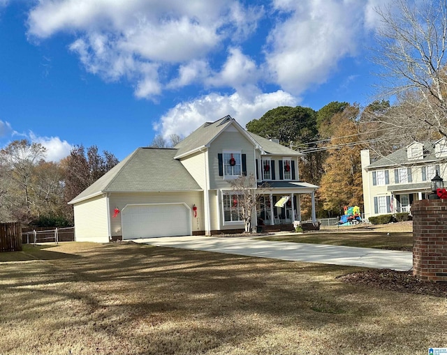 view of front of property featuring a front yard, a porch, a playground, and a garage