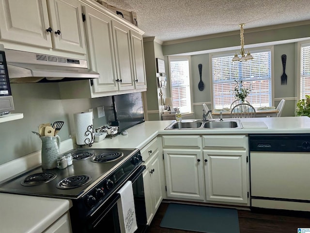 kitchen with white dishwasher, sink, pendant lighting, white cabinets, and black electric range oven