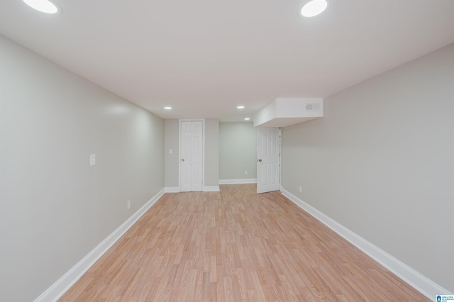 basement with light wood-type flooring