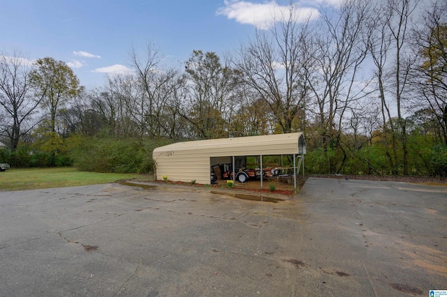 view of parking featuring a carport