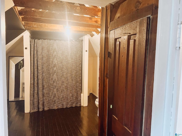 corridor featuring dark hardwood / wood-style floors