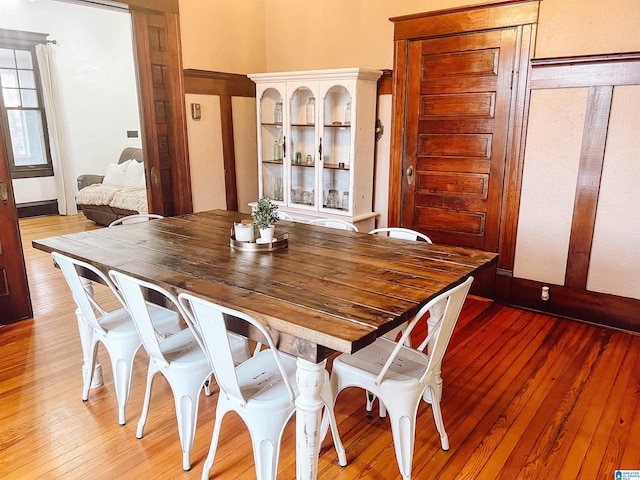 dining room with hardwood / wood-style flooring