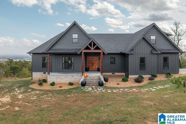 modern farmhouse with a front lawn