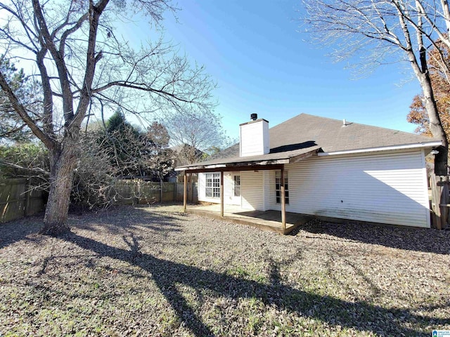 back of house with a patio area