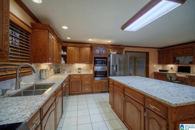 kitchen with sink, appliances with stainless steel finishes, decorative backsplash, light tile patterned floors, and ornamental molding