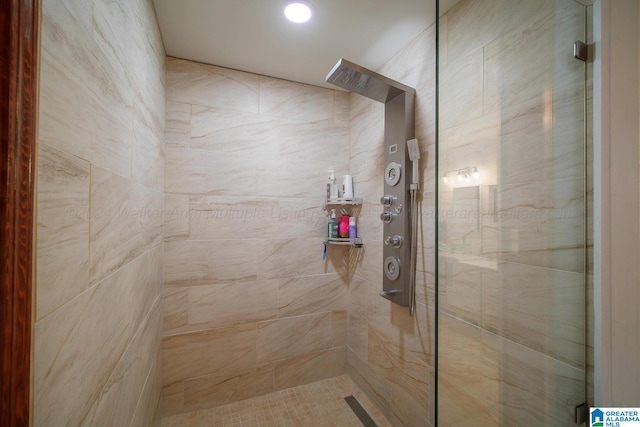 bathroom featuring tiled shower