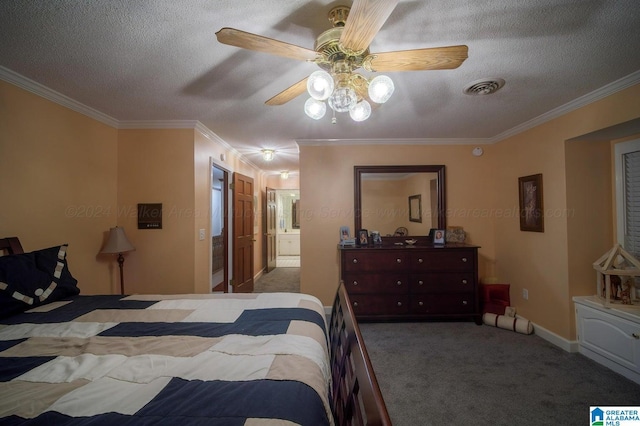 bedroom featuring ensuite bathroom, ornamental molding, a textured ceiling, ceiling fan, and carpet floors