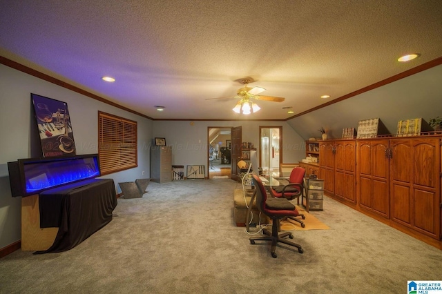 home office featuring a textured ceiling, ceiling fan, crown molding, and light carpet