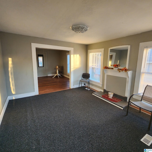 unfurnished room with wood-type flooring