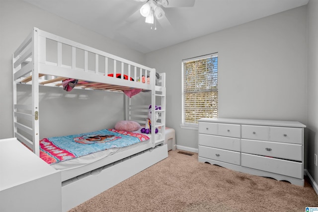 bedroom with light colored carpet and ceiling fan