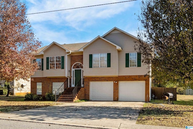 bi-level home featuring a garage