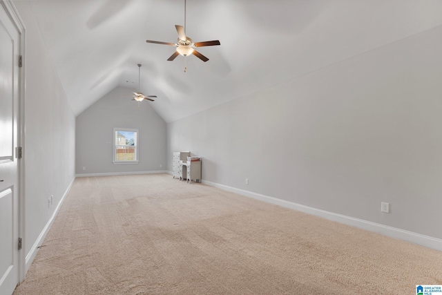 bonus room with light colored carpet, vaulted ceiling, and ceiling fan