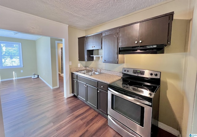 kitchen with dark hardwood / wood-style flooring, dark brown cabinets, a textured ceiling, stainless steel electric stove, and sink