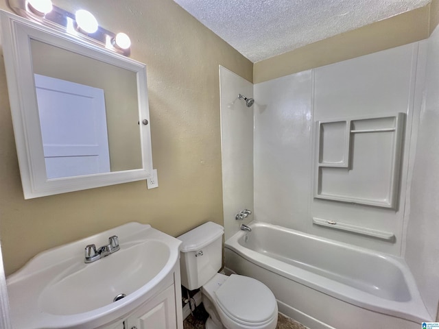 full bathroom with shower / tub combination, vanity, a textured ceiling, and toilet