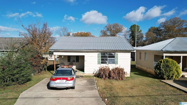 bungalow-style house with a porch and a front yard