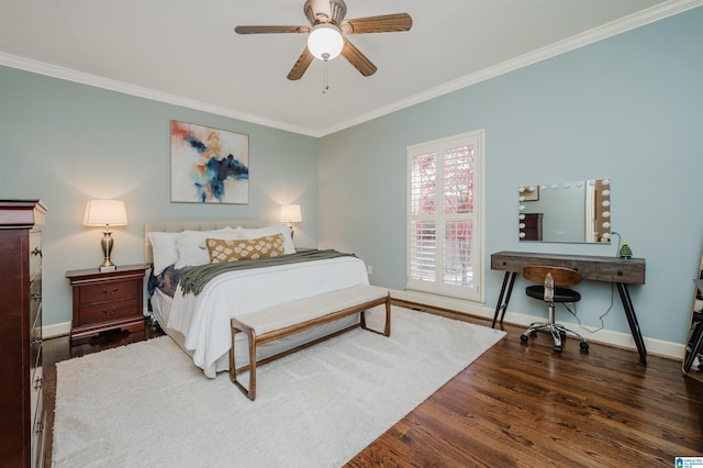 bedroom with ceiling fan, dark hardwood / wood-style flooring, and crown molding