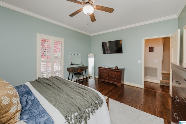 bedroom with ceiling fan, dark hardwood / wood-style floors, and ornamental molding