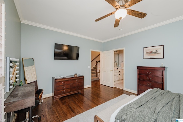 bedroom with connected bathroom, ceiling fan, dark hardwood / wood-style flooring, and crown molding