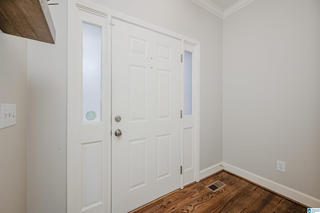 foyer featuring crown molding and dark hardwood / wood-style flooring