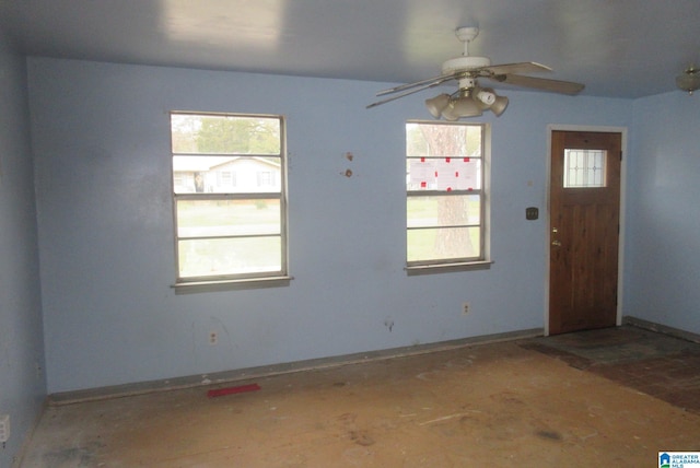 entrance foyer with ceiling fan