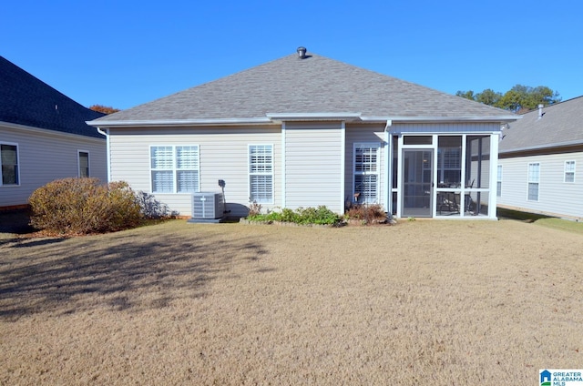 back of house featuring central AC and a sunroom