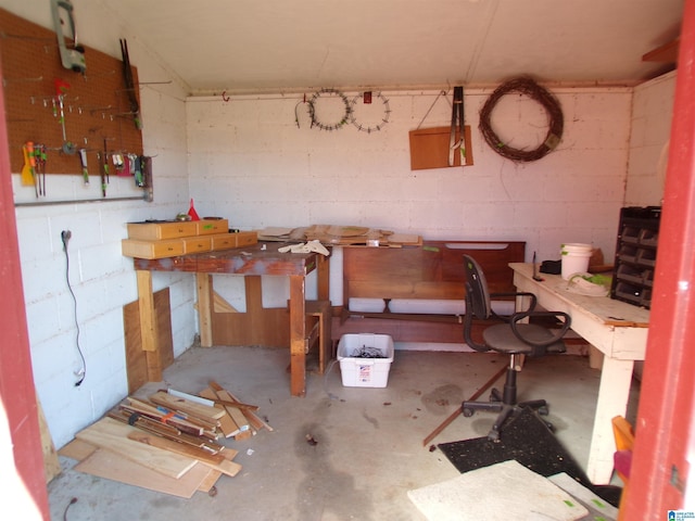 basement with a workshop area